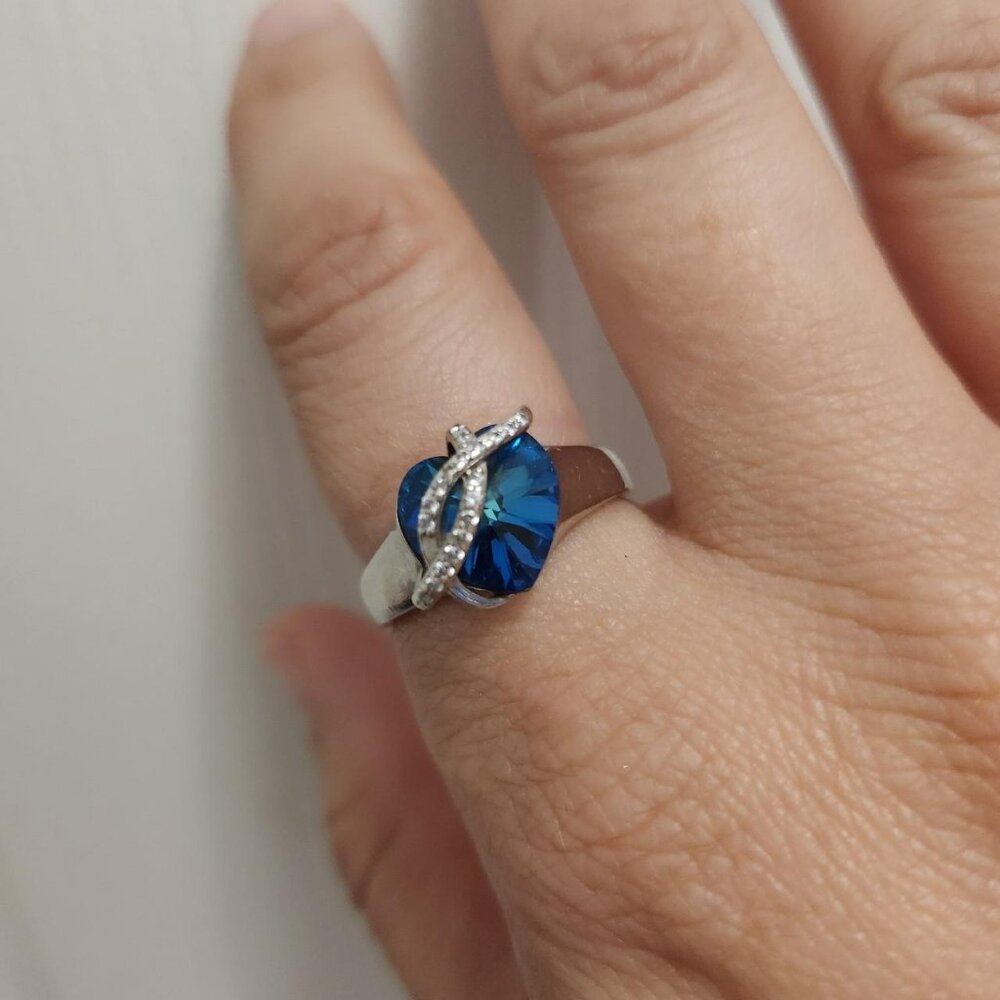 .925 Sterling silver blue heart stone with cubic zirconias , size 8